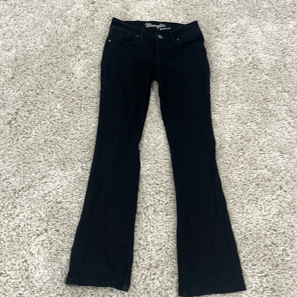 only wore once, black boot cut jeans. size 4.